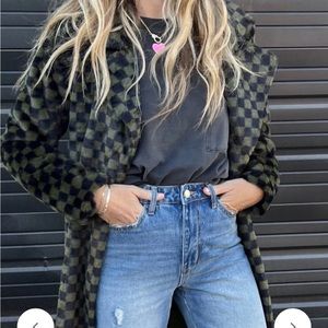 Checkered ascot and hart coat